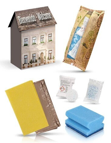 KIT DE BIENVENIDA EN CASA DE CARTON CON BOLSA BIODEGRADABLE CERTIFICADA PARA APARTAMENTOS TURISTICOS